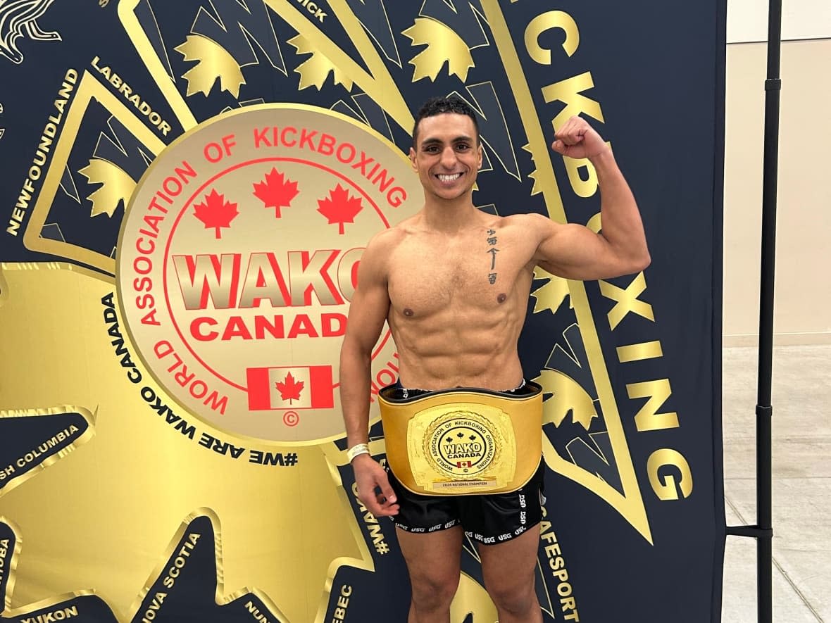 Hady Ghoniem, 28, took home the national title for Rock Athletics in Mount Pearl this weekend at the World Association of Kickboxing Organizations Canada championships in Niagara Falls, Ont. (Submitted by Hady Ghoniem - image credit)