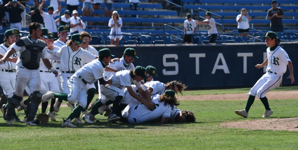 The Royal High baseball team celebrates after winning the CIF-SS Division 4 title.
