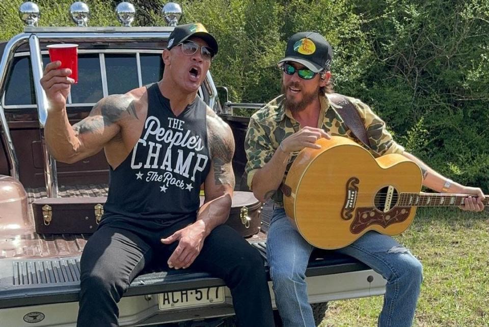 Chris Janson and Dwayne "The Rock" Johnson share candid moments together in Texas during the video shoot for Janson's single "Whatcha See Is Whatcha Get."