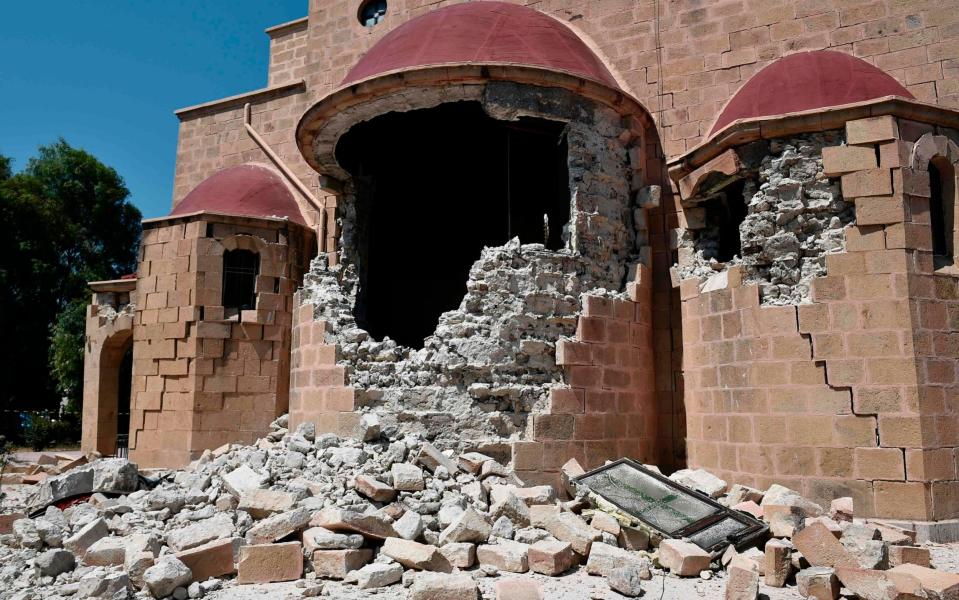 the quake-damaged Church of Saint Nicholas on the Greek Island of Kos - Credit: LOUISA GOULIAMAKI/AFP