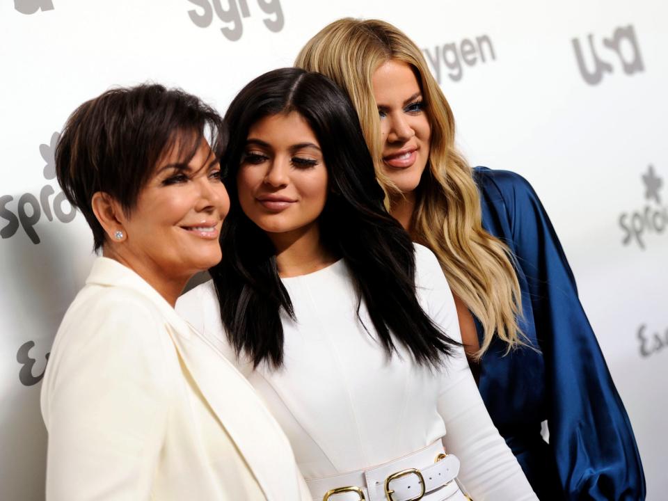 Kris Jenner stands with, from left, Kylie Jenner and Khloe Kardashian at the NBCUniversal Cable Entertainment event in 2015. The three are being sued by Rob Kardashian's former fiancee, Blac Chyna