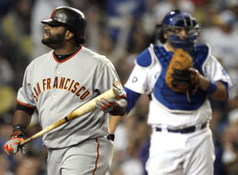 Pinch-hitter Pablo Sandoval returns to the dugout after striking out on three pitches in the eighth inning on Tuesday