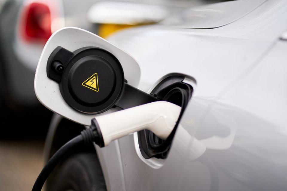 File photo dated 5/3/2021 of an electric car being charged (John Walton/PA) (PA Wire)