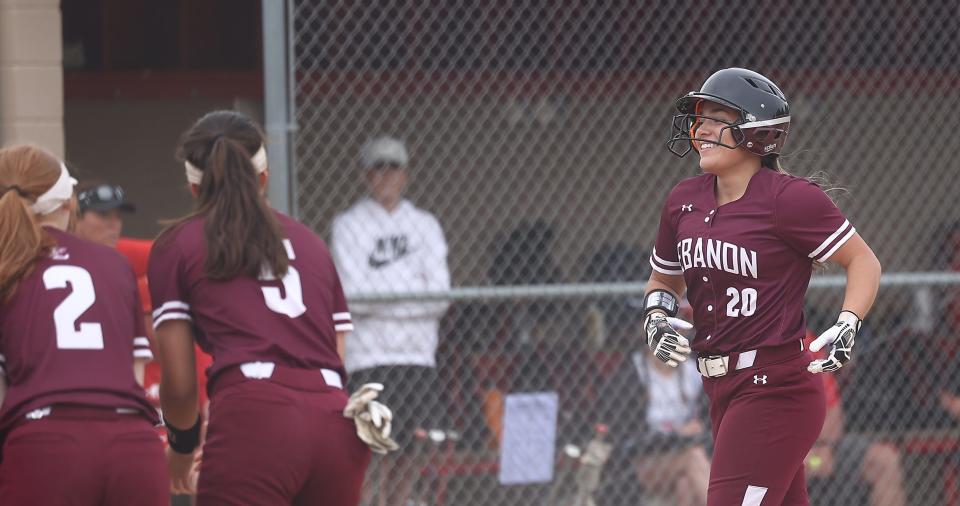 Lebanon's Ella Teubner reacts after hitting a home run during their win over Milford Monday, May 2, 2022.