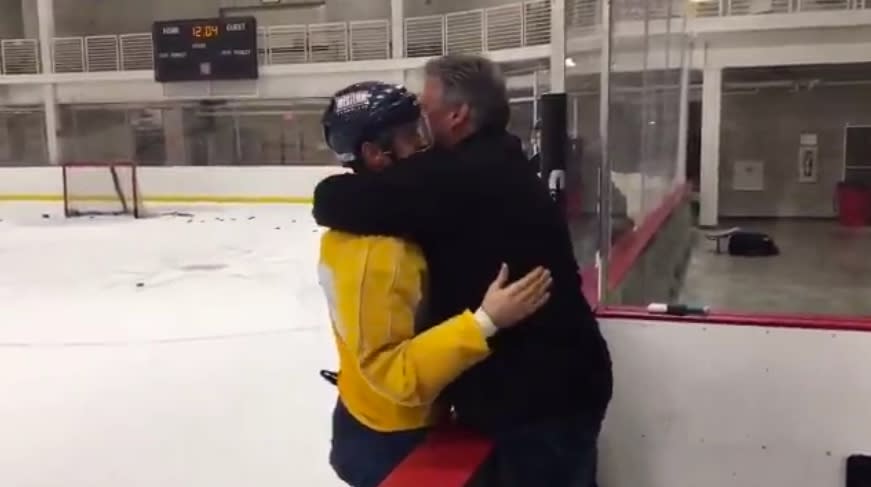 Milwaukee Admirals player Bobby Butler told his dad he was going to the Olympics and got an enormous hug. (Twitter/@mkeadmirals)