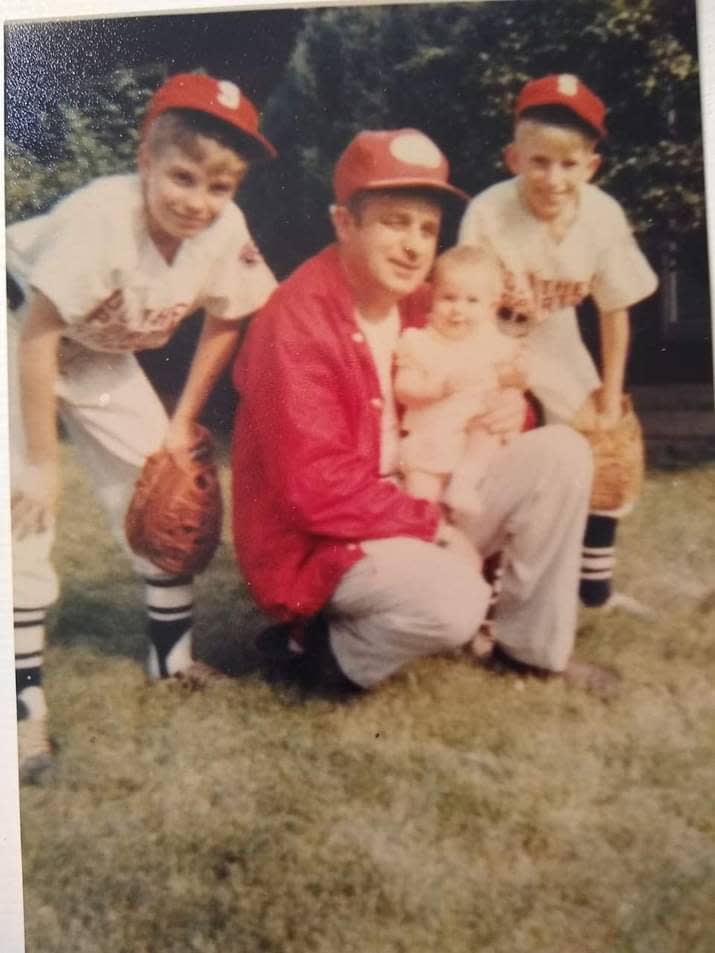 Youth baseball was a family affair for Bud Damon. Here he is pictured with sons Thorn (left) and J.D. (right). On his knee is daughter Carole.