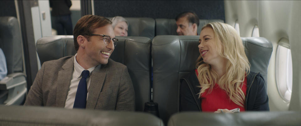 This image released by Netflix shows Ryan Hansen, left, and Iliza Schlesinger in a scene from "Good On Paper." (Netflix via AP)