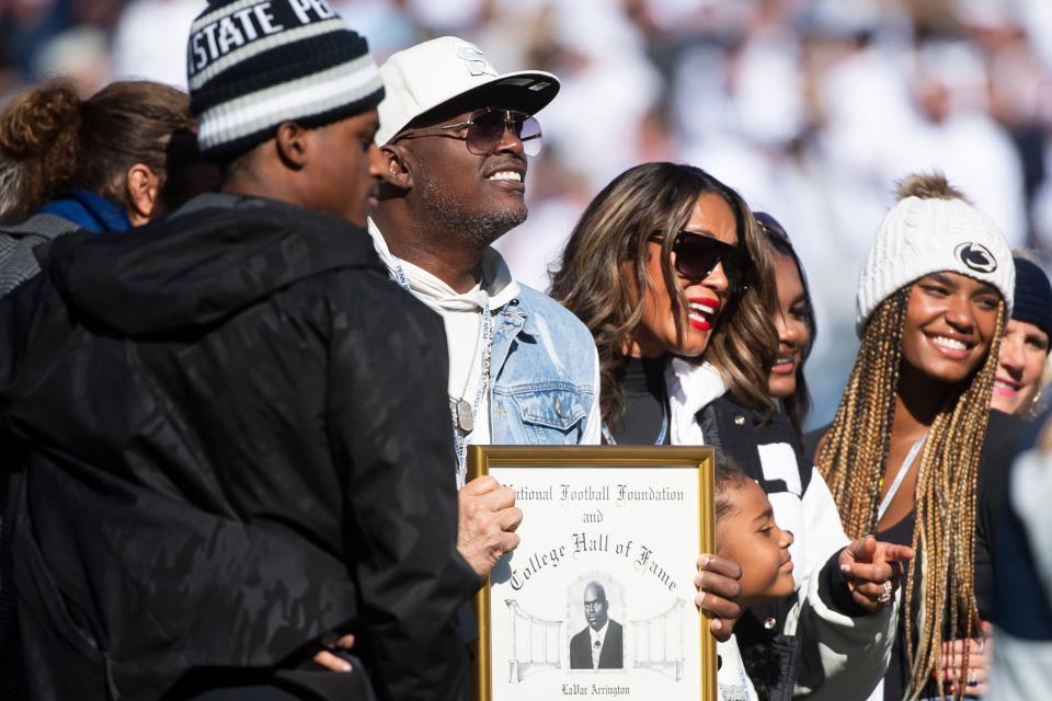 Penn State legendary linebacker LaVar Arrington is honored on the field ahead of his December induction to the College Football Hall of Fame at Beaver Stadium on Saturday, Oct. 29, 2022, in State College.