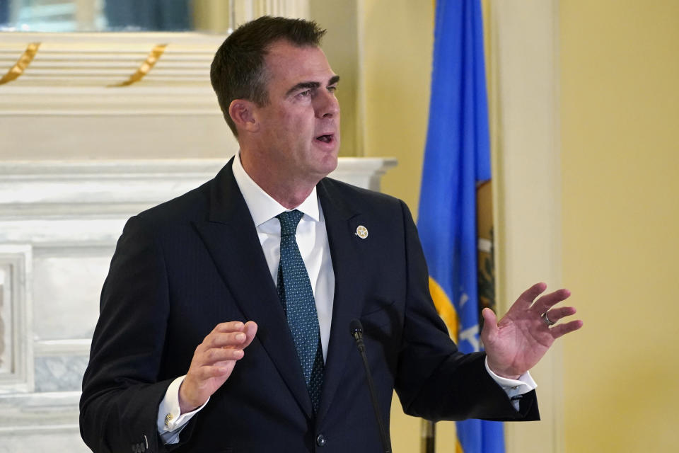 Oklahoma Gov. Kevin Stitt speaks at a news conference Friday, April 29, 2022, in Oklahoma City. Stitt said he has accepted the resignation of Oklahoma's Tourism and Recreation Department Executive Director Jerry Winchester and that the state has filed a lawsuit against the operator of six state park restaurants. (AP Photo/Sue Ogrocki)