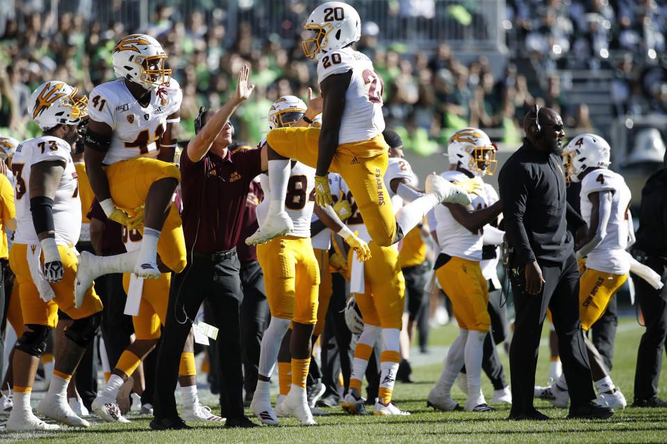 EAST LANSING, MI - SEPTEMBER 14: Khaylan Kearse-Thomas #20 and Tyler Johnson #41 of the Arizona State Sun Devils celebrate after a missed field goal by the Michigan State Spartans in the first half of the game at Spartan Stadium on September 14, 2019 in East Lansing, Michigan. (Photo by Joe Robbins/Getty Images)