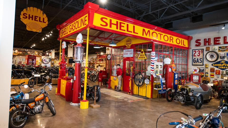 In addition to collecting motorcycles, John Parham also collected vintage road signs and memorabilia. Here, pieces from a vintage Shell gas station are shown inside the National Motorcycle Museum. The museum's holdings will be auctioned off in the days following the museum's closure Sept. 4.