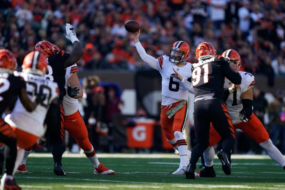 Cleveland Browns quarterback Baker Mayfield (6) throws during the first half of an NFL football game against the Cincinnati Bengals, Sunday, Nov. 7, 2021, in Cincinnati. (AP Photo/Bryan Woolston)