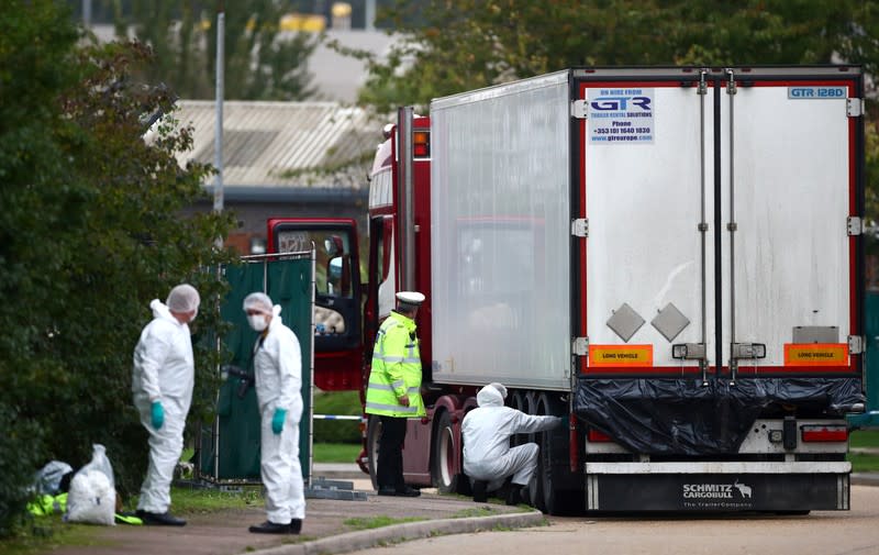 The scene where bodies were discovered in a lorry container, in Grays, Essex