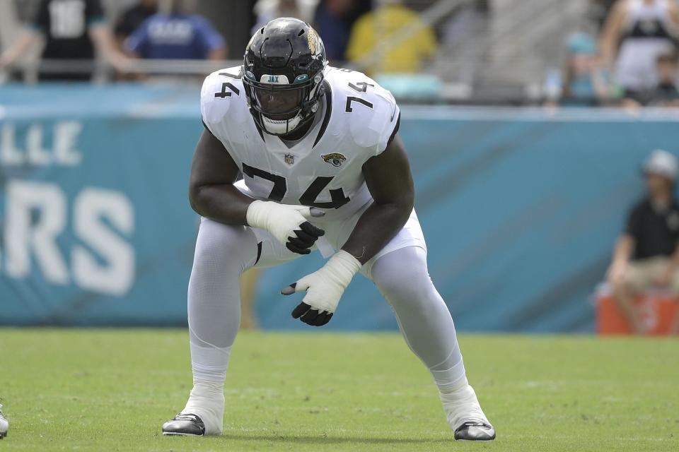 Jacksonville Jaguars offensive tackle Cam Robinson prepares for a play against the Denver Broncos during the first half of an NFL football game, Sunday, Sept. 19, 2021, in Jacksonville, Fla. (AP Photo/Phelan M. Ebenhack)