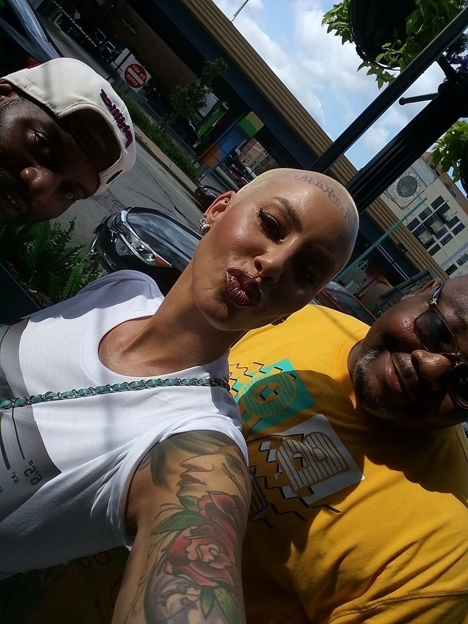 Former reality TV star, rapper and model Amber Rose takes a selfie with fans on Monday, July 15, 2024, in downtown Milwaukee on the first day of the RNC.