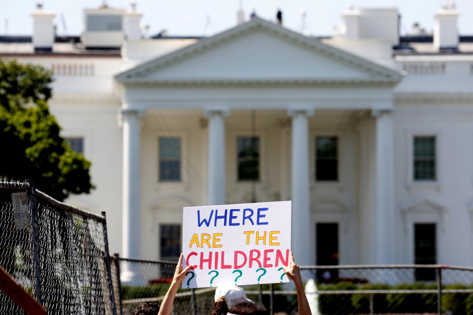 <p>An immigration activists hold signs against family separation during a rally to protest against the Trump Administration’s immigration policy outside the White House in Washington, June 30, 2018. (Photo: Joshua Roberts/Reuters) </p>