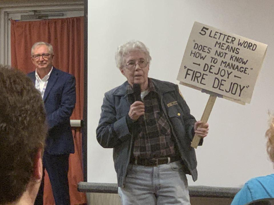 Retired letter-carrier Roz Stein rejects the proposal to change Springfield's USPS distribution center at a public meeting on March 26, 2024, in Springfield.