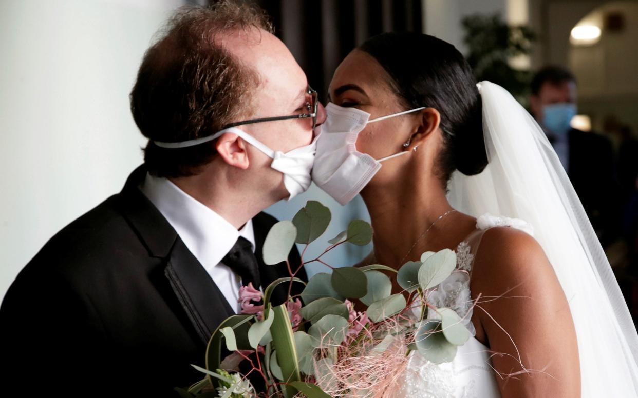 Lockdown wedding - CIRO DE LUCA/Reuters