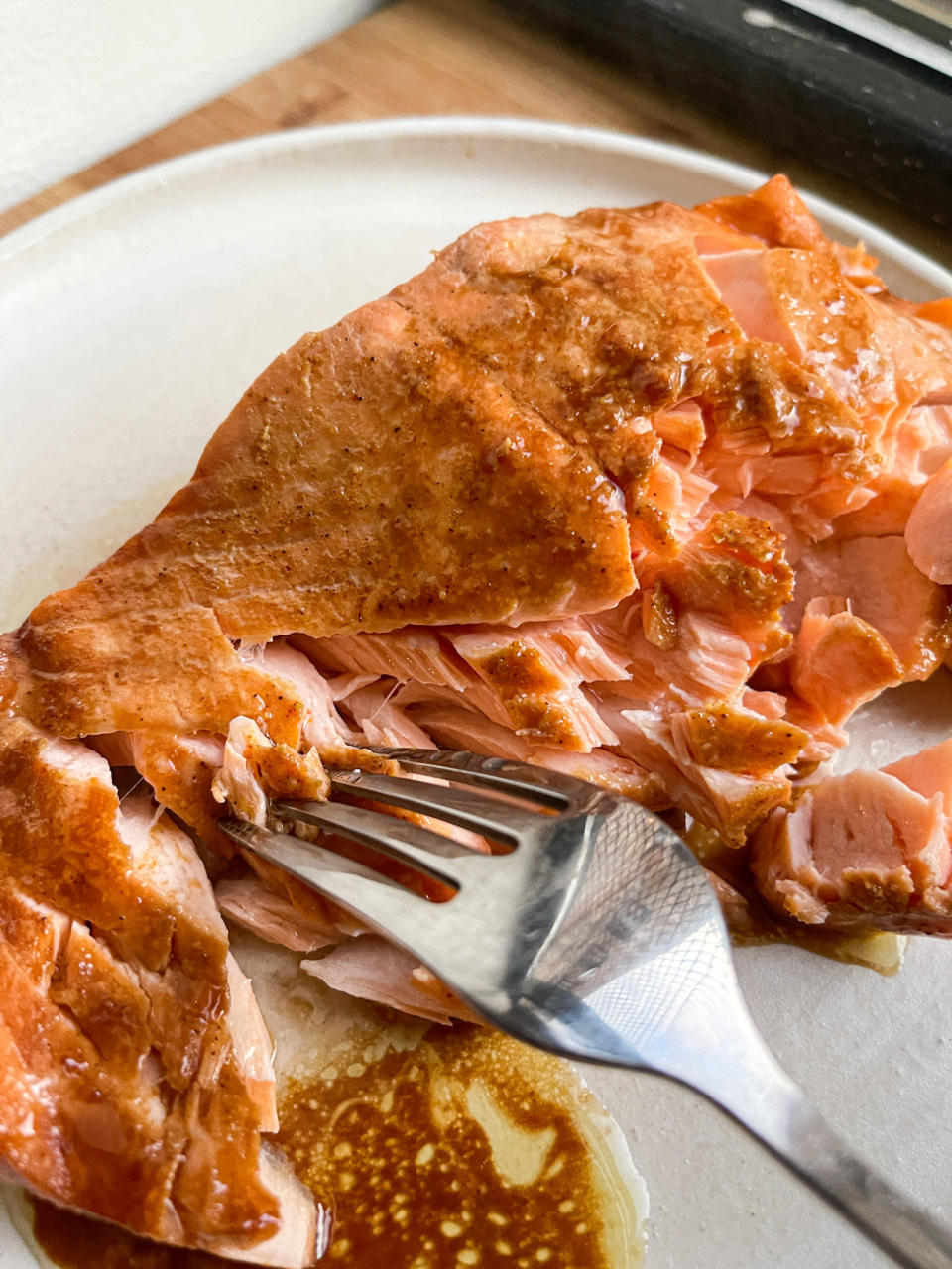A fork in cut-up salmon