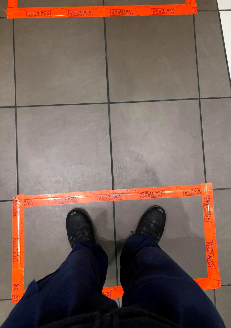 Customer have to stand in these boxes (Picture: SWNS)