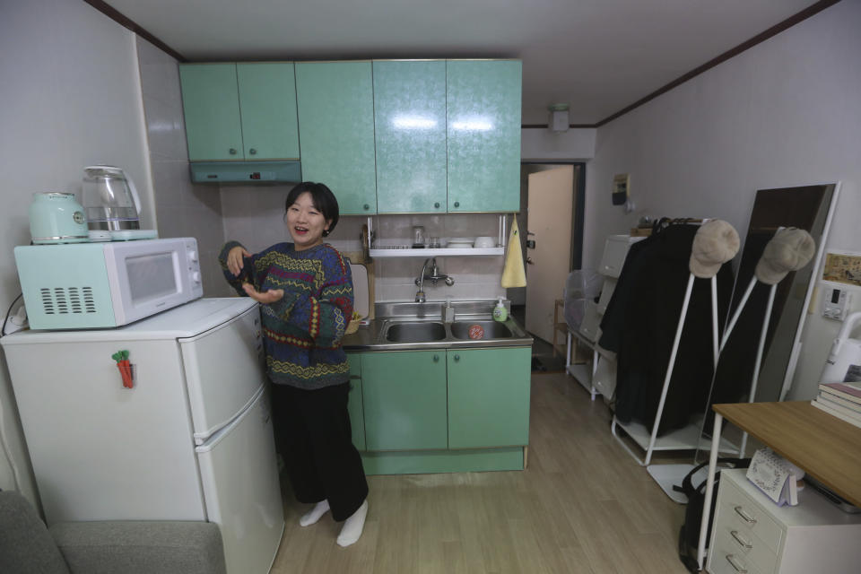 Kim Da-hye, a 29-year-old South Korean, talks about her semi-basement apartment in Seoul, South Korea, Saturday, Feb. 15, 2020. For many South Koreans, the image of a cramped basement apartment portrayed in the Oscar-winning film “Parasite” rings true, bringing differences in their social status to worldwide attention.(AP Photo/Ahn Young-joon)