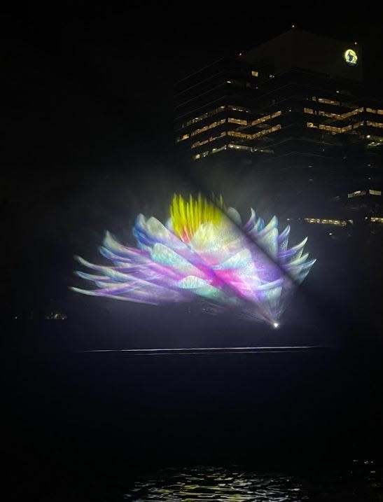 A nightly themed light show, set to music, is being designed for Friendship Fountain, with images to be projected on the screen of mist made by the water. This photo was taken during a test of the system in September.