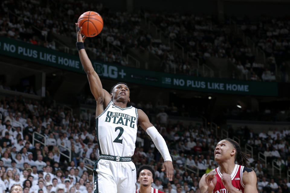 Michigan State's Tyson Walker shoots against Indiana's Malik Reneau during the second half of an NCAA college basketball game Tuesday, Feb. 21, 2023, in East Lansing, Mich. (AP Photo/Al Goldis)