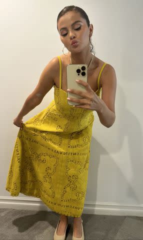 <p>Selena Gomez/Instagram</p> Selena Gomez wears a chic yellow dress in selfie