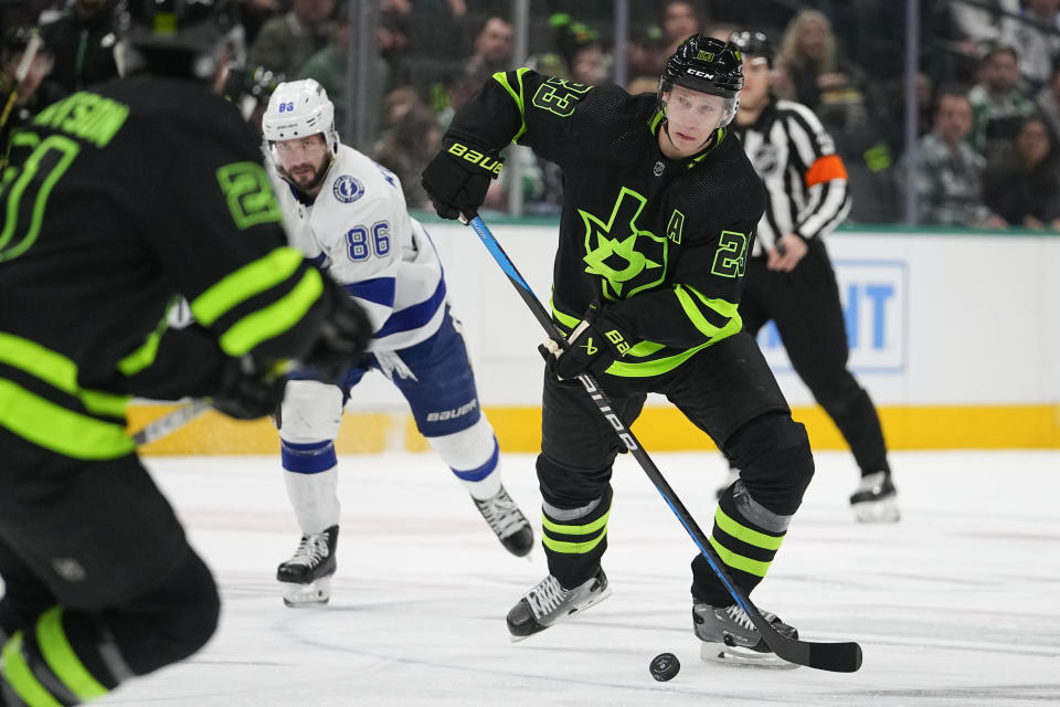 Dallas Stars defenseman Esa Lindell (23) skates against the Tampa Bay Lightning during the first period of an NHL hockey game, Saturday, Dec. 2, 2023, in Dallas. (AP Photo/Julio Cortez)