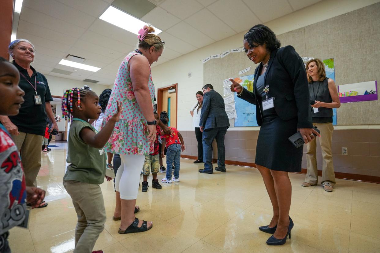 Cincinnati Public Schools Superintendant and CEO, Iranetta Rayborn Wright tours Aiken High School on the first day of school on Thursday August 18, 2022. Wright walked around, greeting students and staff and taking selfies with them.