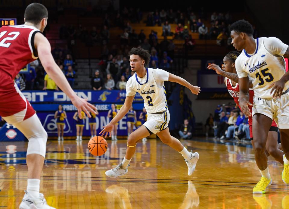 South Dakota State's Zeke Mayo dribbles the ball across the court during a rivalry matchup against South Dakota on Saturday, January 8, 2022, at Frost Arena in Brookings.