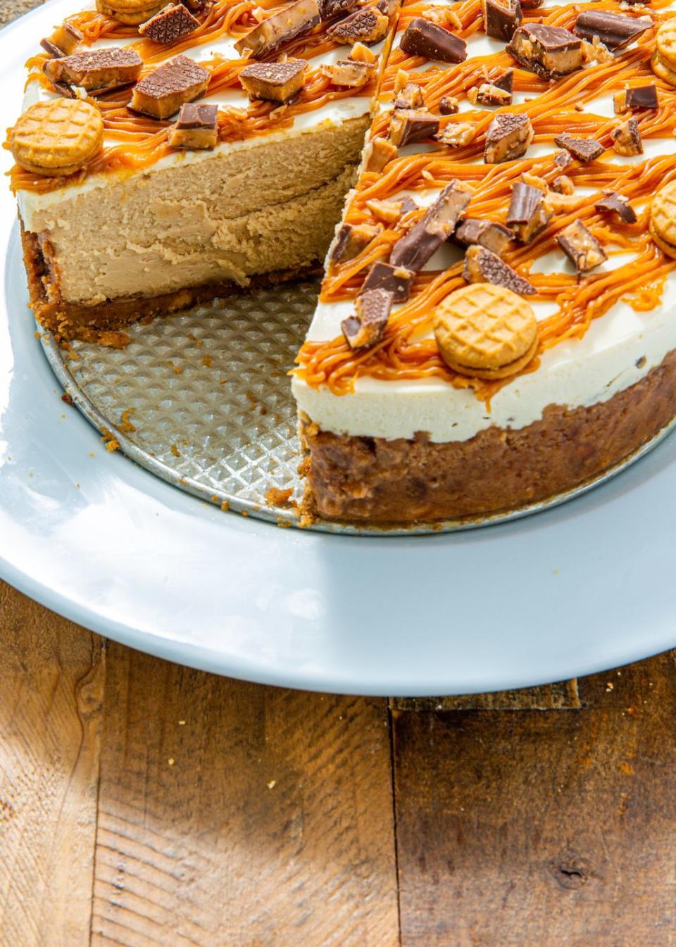 <p>There's no such thing as too much peanut butter. </p><p>Get the recipe from <a href="https://www.delish.com/cooking/recipe-ideas/a29667085/nutter-butter-cheesecake-recipe/" rel="nofollow noopener" target="_blank" data-ylk="slk:Delish;elm:context_link;itc:0;sec:content-canvas" class="link ">Delish</a>. </p>