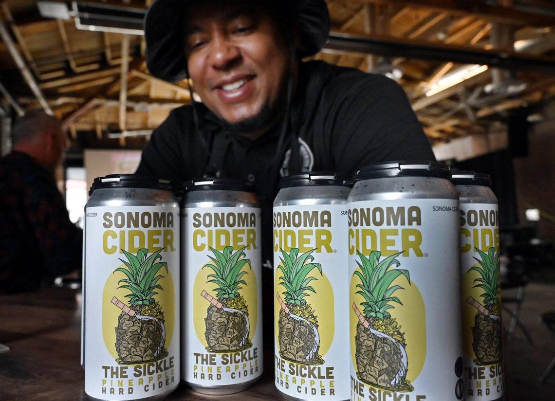 Full Circle Brewing’s CEO Arthur Moye showcases new pineapple-flavored hard cider marketed through the Sonoma Cider brand, shown Saturday, Feb. 4, 2023 in Fresno.