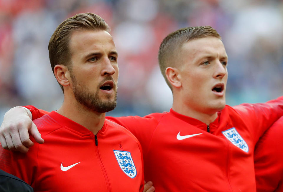 <p>England’s Harry Kane and Jordan Pickford line up during the national anthem before the match (REUTERS/Toru Hanai) </p>