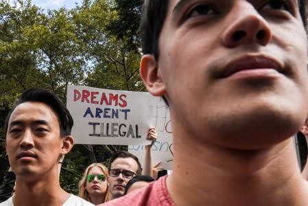 FILE PHOTO: People participate in a protest in defense of the Deferred Action for Childhood Arrivals program or DACA in New York