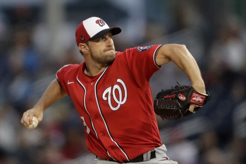 Washington Nationals starting pitcher Max Scherzer (31) works against the Houston Astros during spring training baseball game Saturday, Feb. 22, 2020, in West Palm Beach, Fla. (AP Photo/John Bazemore)