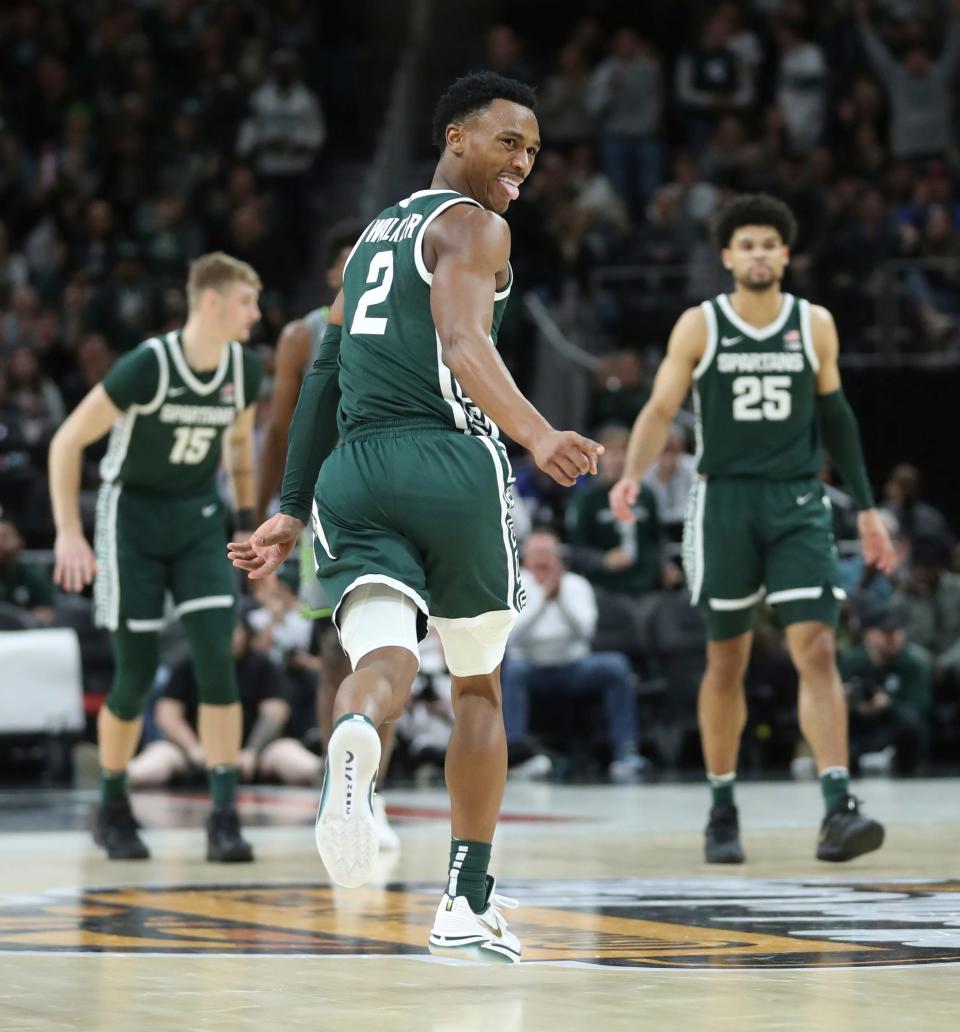 Michigan State guard Tyson Walker reacts after scoring against Baylor guard Jayden Nunn during the second half of MSU's 88-64 win over Baylor on Saturday, Dec.16, 2023, at Little Caesars Arena.