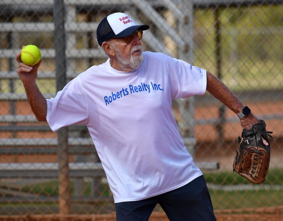 Dave Wulfsohn, 90, throws the ball to the pitcher during a game at Sarasota Senior Softball Thursday at 17th Street Park. 