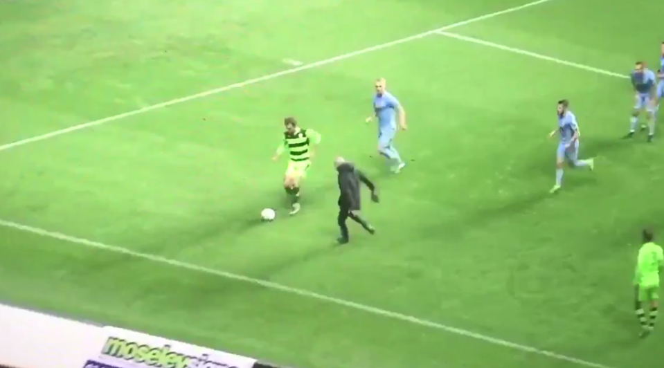 A Coventry fan ran onto the pitch, and players had to quell his anger. (Screenshot: @JoeCrossley_ on Twitter)