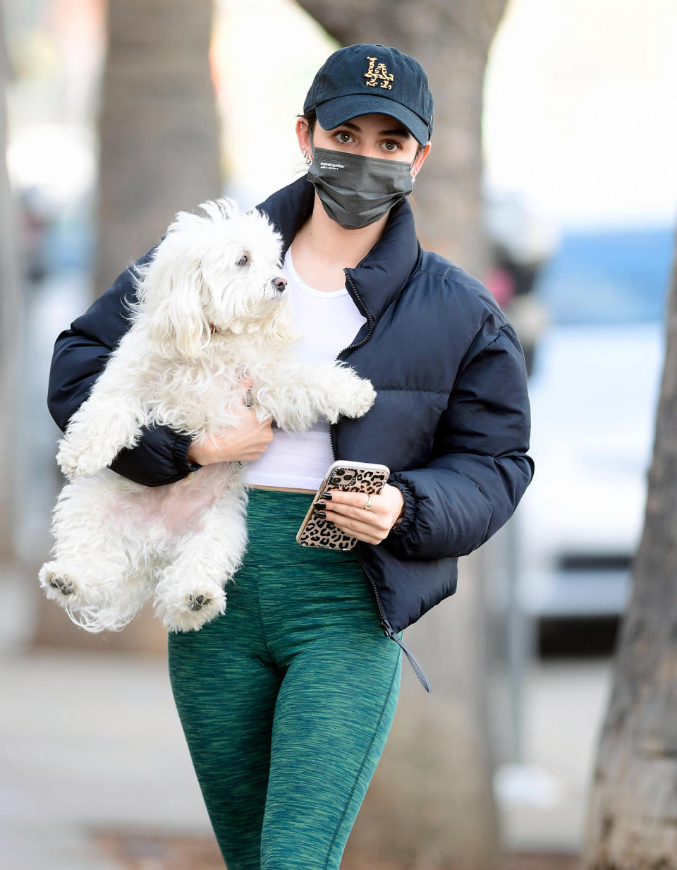 <p>Lucy Hale steps out in L.A. on Tuesday, wearing a baseball cap, leggings and a puffer coat, as her dog Elvis comes along for the ride.</p>