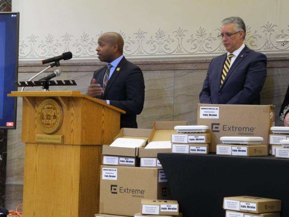 Milwaukee Mayor Cavalier Johnson shares his thoughts Feb. 1 on the donation by Franklin-based Advanced Wireless, Inc. of over 800 Wi-Fi access points to Milwaukee's sister city of Irpin, Ukraine, with President of AWI Darryl Morin looking on.