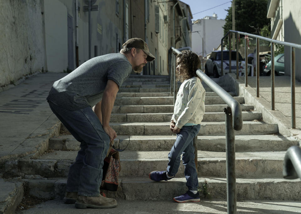 This image released by Focus Features shows Matt Damon, left, and Lilou Siauvaud in a scene from "Stillwater." (Jessica Forde/Focus Features via AP)