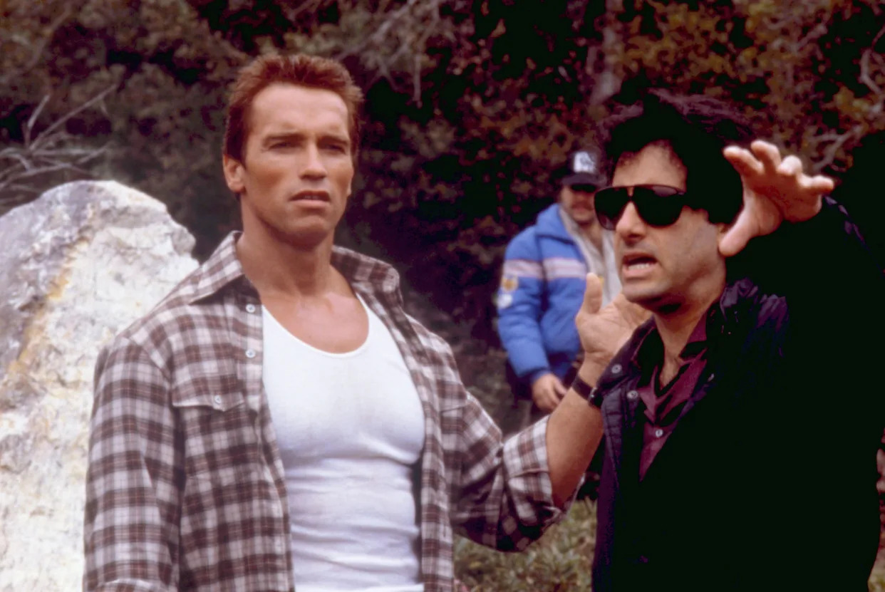 Schwarzenegger and Mark Lester on the set of 'Commando' (Photo: 20thCentFox/Courtesy Everett Collection)