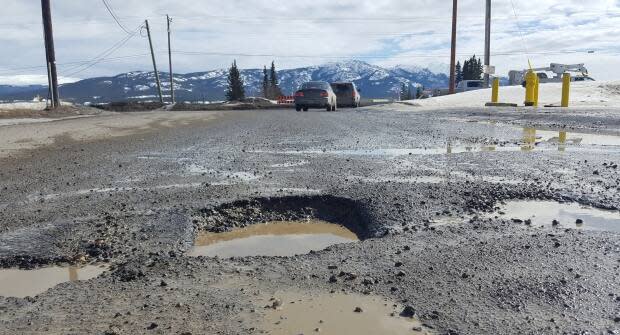 They appear every spring, but this year's potholes are offering a particularly bumpy ride to Whitehorse drivers. (Paul Tukker/CBC - image credit)