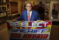 Former Maricopa County Sheriff Joe Arpaio poses for a picture in his office as he is running for the position of Maricopa County Sheriff again, Wednesday, July 22, 2020, in Fountain Hills, Ariz. He faces his former second-in-command, Jerry Sheridan, in the Aug. 4 Republican primary in what has become his second comeback bid. The 88-year-old lawman was unseated in the 2016 sheriff’s race and was trounced in a 2018 U.S. Senate race. (AP Photo/Ross D. Franklin)