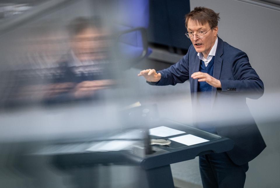 Karl Lauterbach, Federal Minister of Health, speaks at the Bundestag session in Berlin, Germany, Thursday, April 7, 2020. The Bundestag votes on mandatory vaccination against the coronavirus. (Michael Kappeler/dpa via AP)