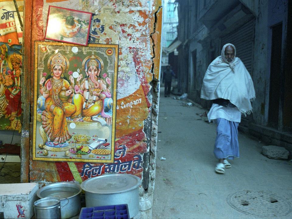 A man walks through Varanasi in 2001.