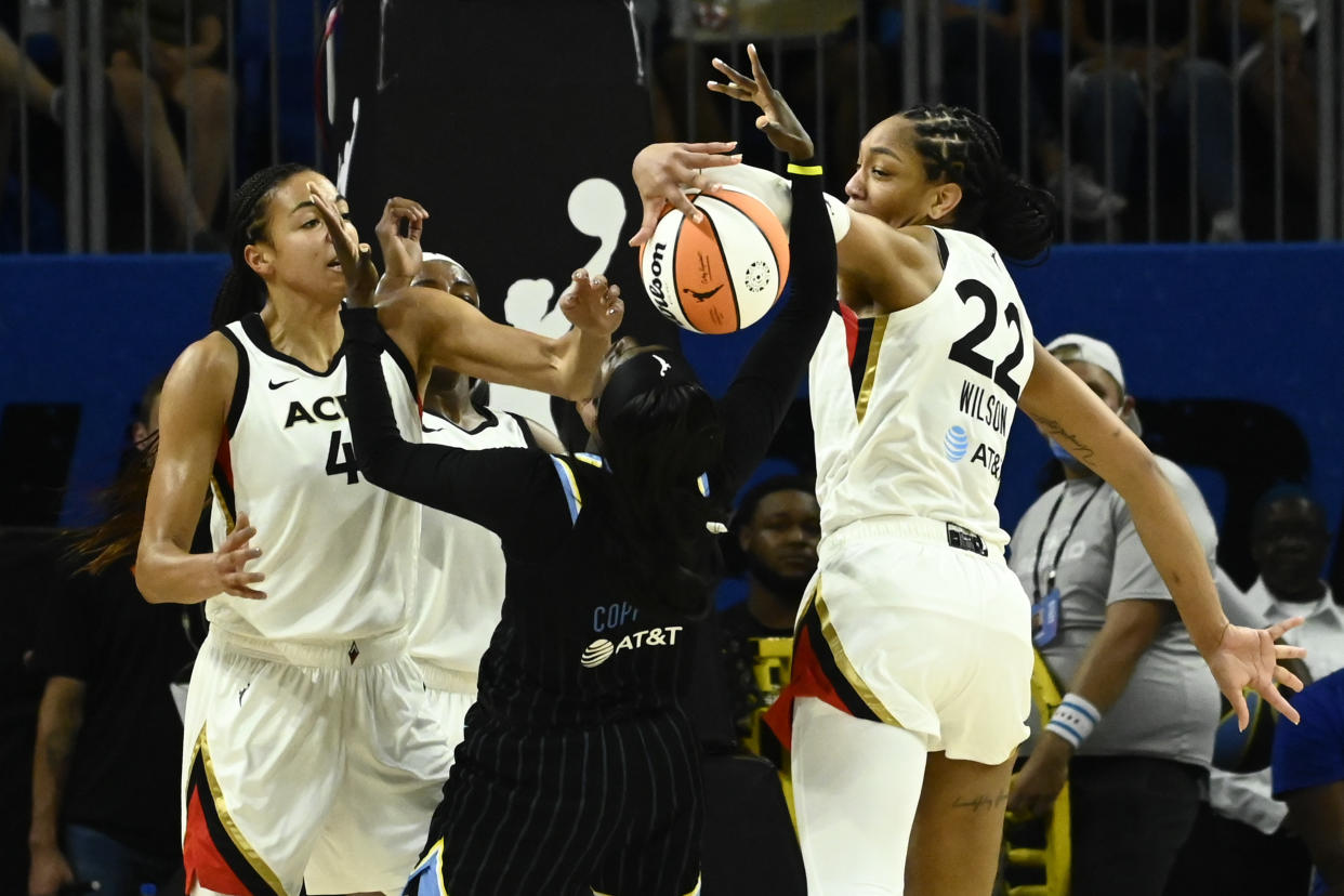 Jul 26, 2022; Chicago, IL, USA;  Las Vegas Aces center Kiah Stokes (41), left and Las Vegas Aces forward A'ja Wilson (22) block a ball shot by Chicago Sky guard Kahleah Copper (2) during the second half of the Commissioners Cup-Championships at Wintrust Arena. Mandatory Credit: Matt Marton-USA TODAY Sports