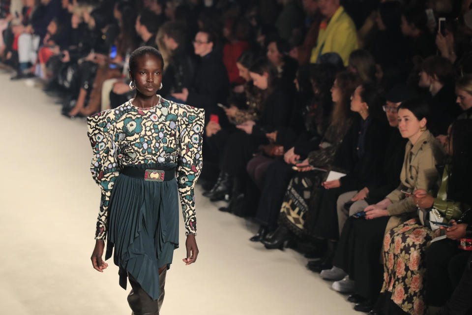 A model wears a creation for the Isabel Marant fashion collection during Women's fashion week Fall/Winter 2020/21 presented in Paris, Thursday, Feb. 27, 2020. (AP Photo/Michel Euler)