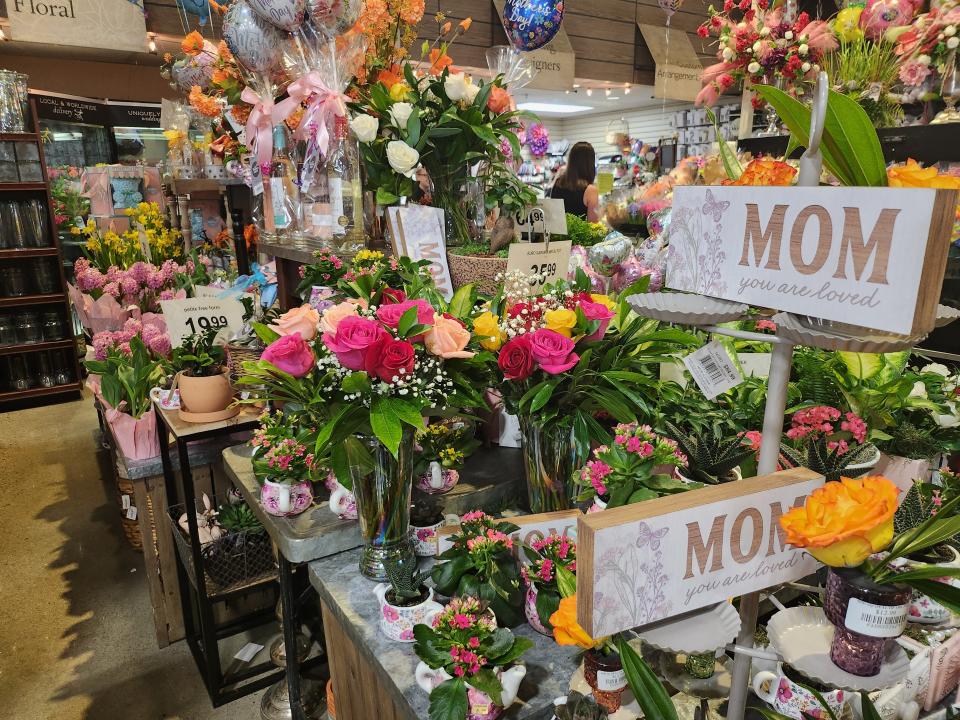 Market Street United on Georgia Street in Amarillo prepares hundreds of their best seller, rose bouquets, for Mother's Day.